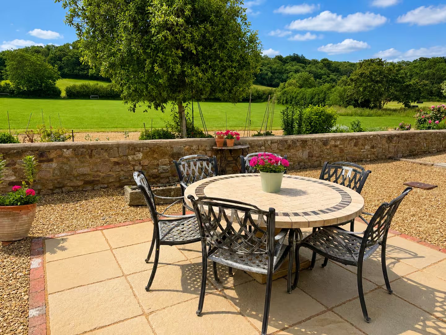 Private patio with outdoor dining and countryside views